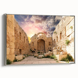 Framed canvas featuring a landscape art painting of ancient ruins in muted earth tones.