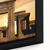 Close-up of a black framed canvas featuring ancient ruins in colorful, textured art.