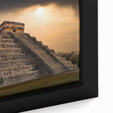 Framed canvas featuring a close-up of ancient ruins in textured black with colorful accents.