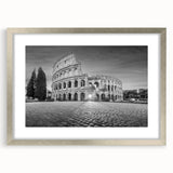 Textured art print of ancient ruins in muted earth tones on a framed silver mat, ideal for bedroom decor.