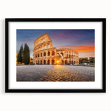 Textured abstract art print depicting colorful ancient ruins, presented in a large black frame with mat.
