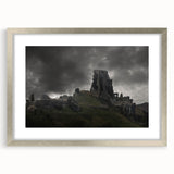 Extra large wall art depicting ancient ruins in muted earth tones on a textured canvas, framed in silver.