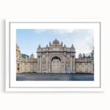 Abstract art print of ancient ruins in muted earth tones on a white-framed canvas, suitable for dining room decor.