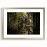 Textured art print of abstract ancient ruins in muted earth tones, framed with a silver mat, ideal for bedroom art.