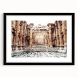 Extra large abstract art print of colorful ancient ruins on textured canvas, framed in black, suitable for living room decor.