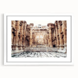 Abstract art print of ancient ruins in muted earth tones on a framed white mat, suitable for dining room decor.