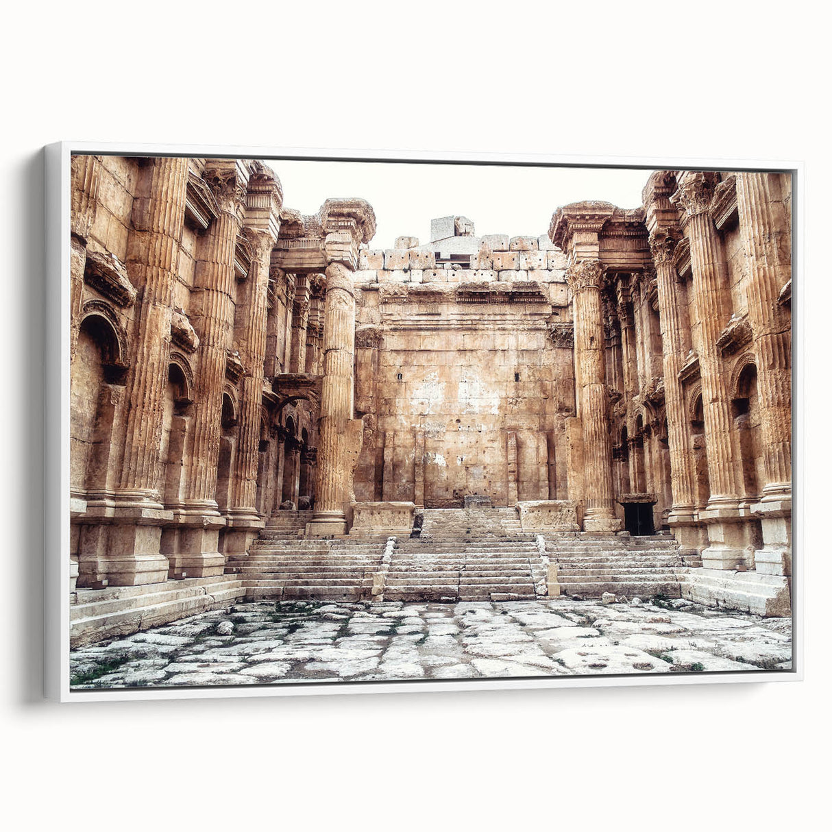 Vintage poster art of ancient ruins in muted earth tones on a large framed canvas, ideal for living room decor.