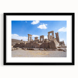 Extra large abstract art print of colorful, textured ancient ruins on black-framed canvas, ideal for living room decor.