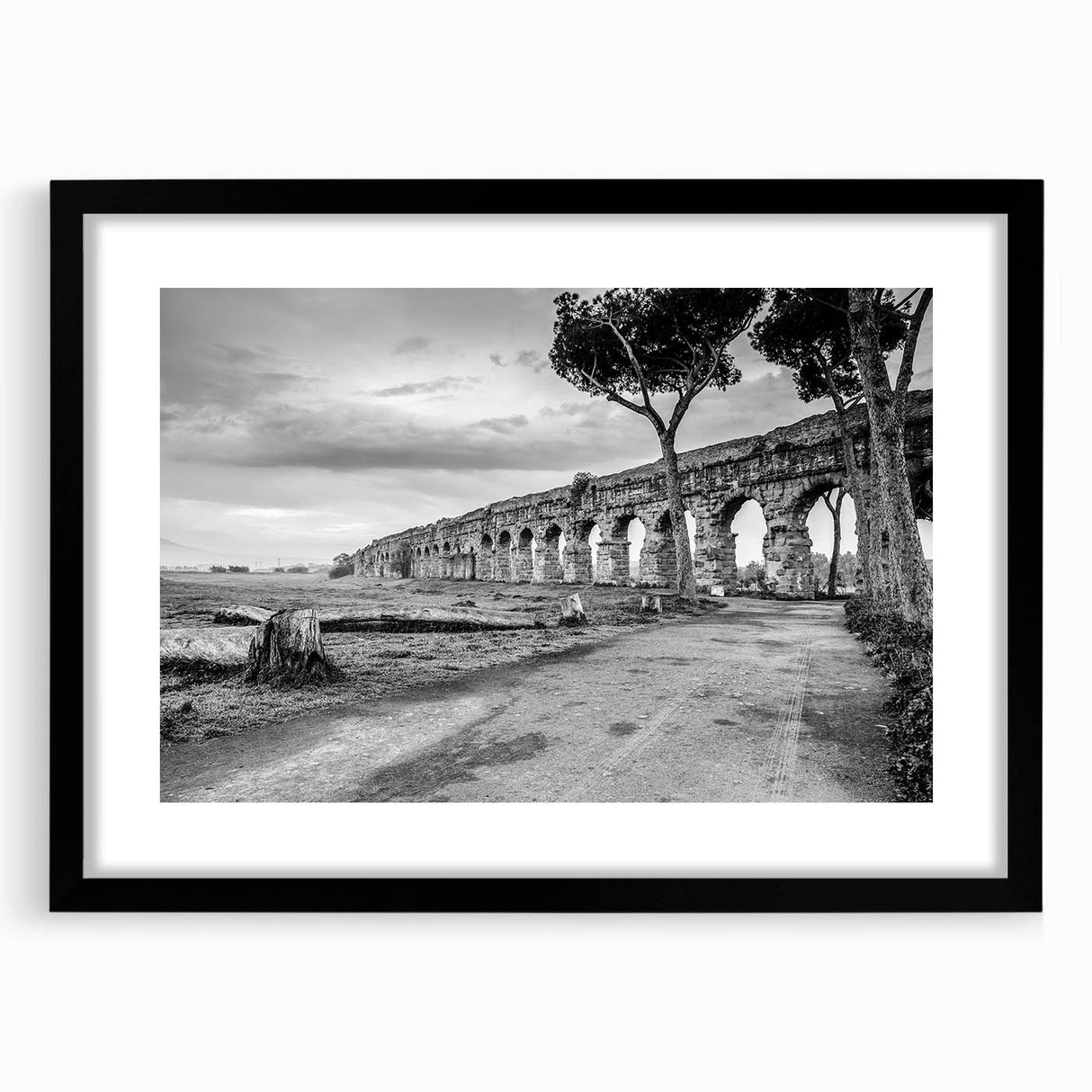 Extra large abstract art print featuring colorful, textured arches on a black framed canvas, ideal for living room decor.