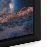 Close-up of black wall art featuring colorful, textured arches on a framed canvas, ideal for living room decor.
