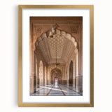 Abstract art print featuring geometric arch designs in gold and black, framed with a mat, ideal for dining room decor.