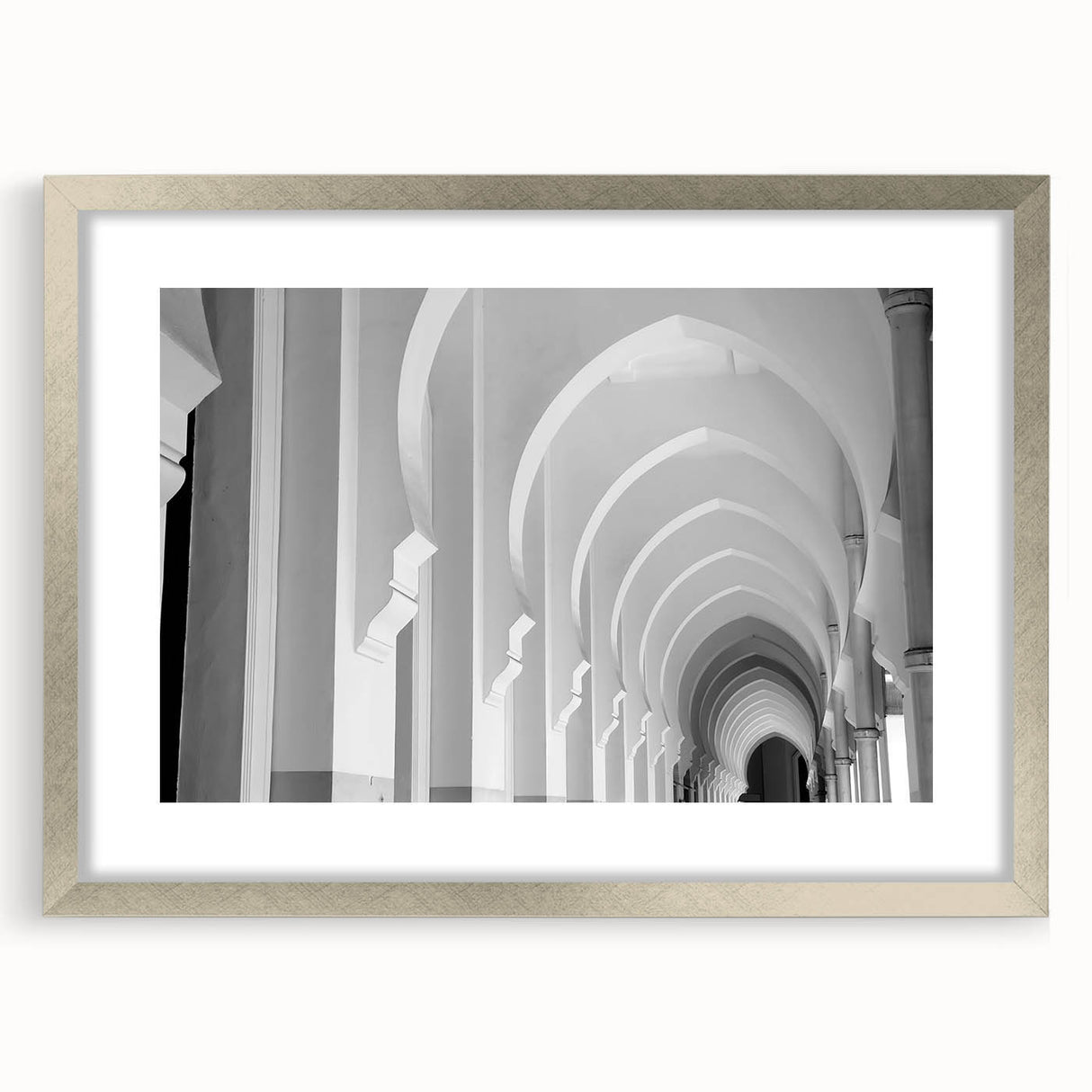 Textured art print featuring abstract arch designs in muted gray and white, framed in silver, ideal for modern bedroom decor.