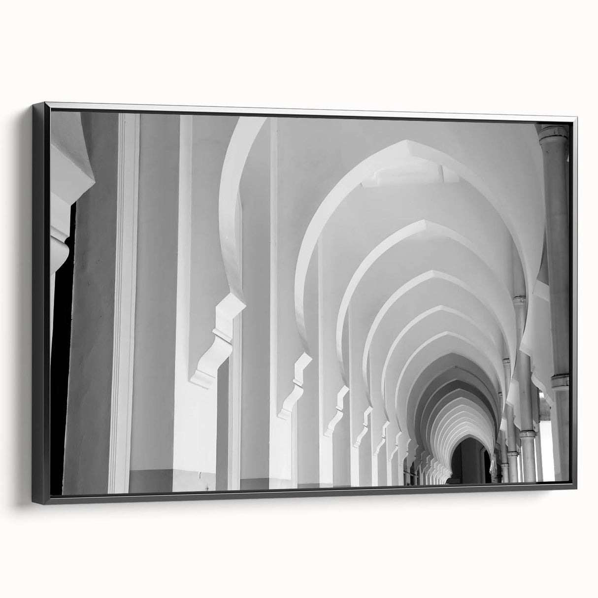 Black and white framed canvas of vintage-style architectural arches, ideal for bedroom wall decor.
