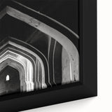 Close-up of extra large black wall art featuring colorful, textured arches on framed canvas, ideal for living room decor.