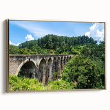 Vintage poster art of architectural arches in black with colorful accents on a framed canvas, ideal for living room decor.