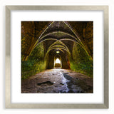 Abstract textured art print featuring curved arches in earth tones, displayed in a silver frame with mat.