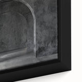 Close-up of black wall art featuring colorful, textured arches on a framed canvas, ideal for living room decor.