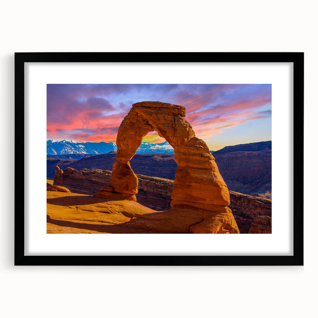 Extra large abstract art print featuring colorful, textured arches on a black framed canvas, ideal for living room decor.