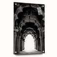 Acrylic glass print of large abstract architecture with arch designs in muted earth tones.