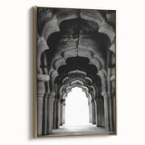Framed canvas of vintage-style landscape painting featuring arches in muted gold and black, ideal for bedroom wall art.