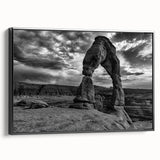 Black and white wall art featuring a series of architectural arches, printed on framed canvas, ideal for bedroom wall decor.