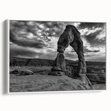 Framed canvas featuring a black and white vintage poster of architectural arches, ideal for bedroom wall decor.