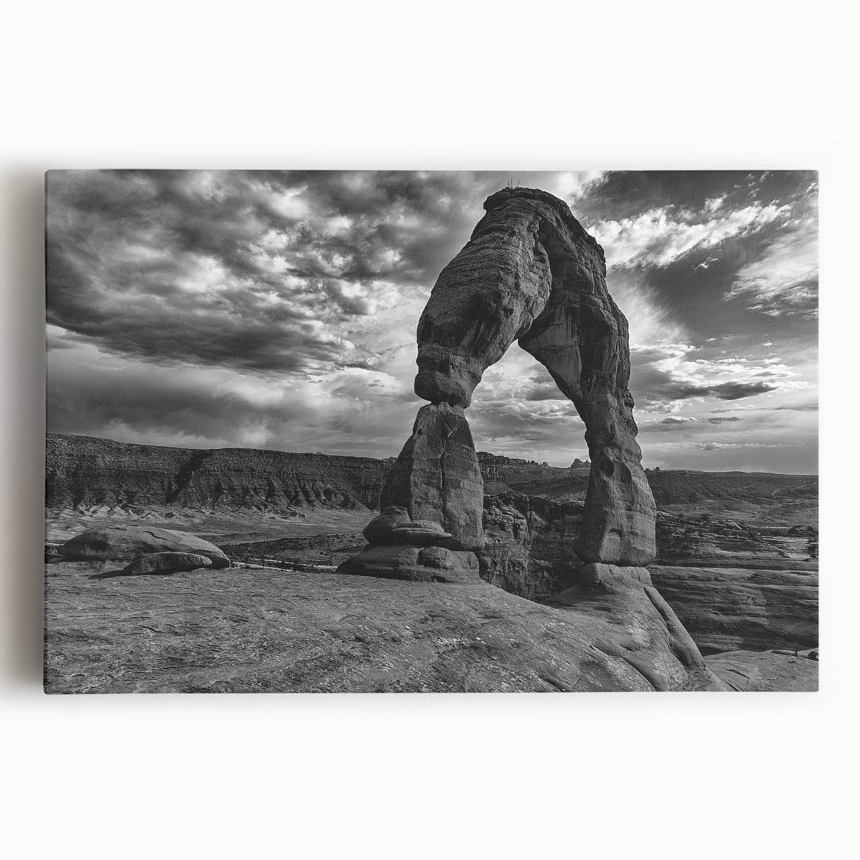Black and white photo of architectural arches on stretched canvas, ideal for kitchen wall art or bedroom decor.
