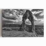 Black and white photo of architectural arches on stretched canvas, ideal for kitchen wall art or bedroom decor.