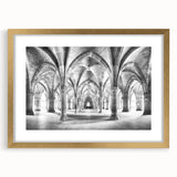 Abstract art print featuring geometric arch designs in gold and black, framed with a mat, ideal for dining room decor.