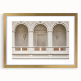 Abstract art print featuring geometric arches in gold and white tones, framed with a mat, ideal for dining room decor.