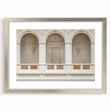Textured abstract art print featuring curved architectural forms in neutral tones, framed in silver, ideal for bedroom decor.