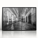 Large abstract wall art featuring black and white arches in a mid-century modernist style, framed in black acrylic.