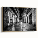 Framed canvas wall art featuring a landscape of architectural arches in black, ideal for bedroom decor.