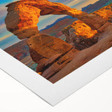 Art deco poster featuring geometric arch designs in muted gold and black tones on rolled canvas.