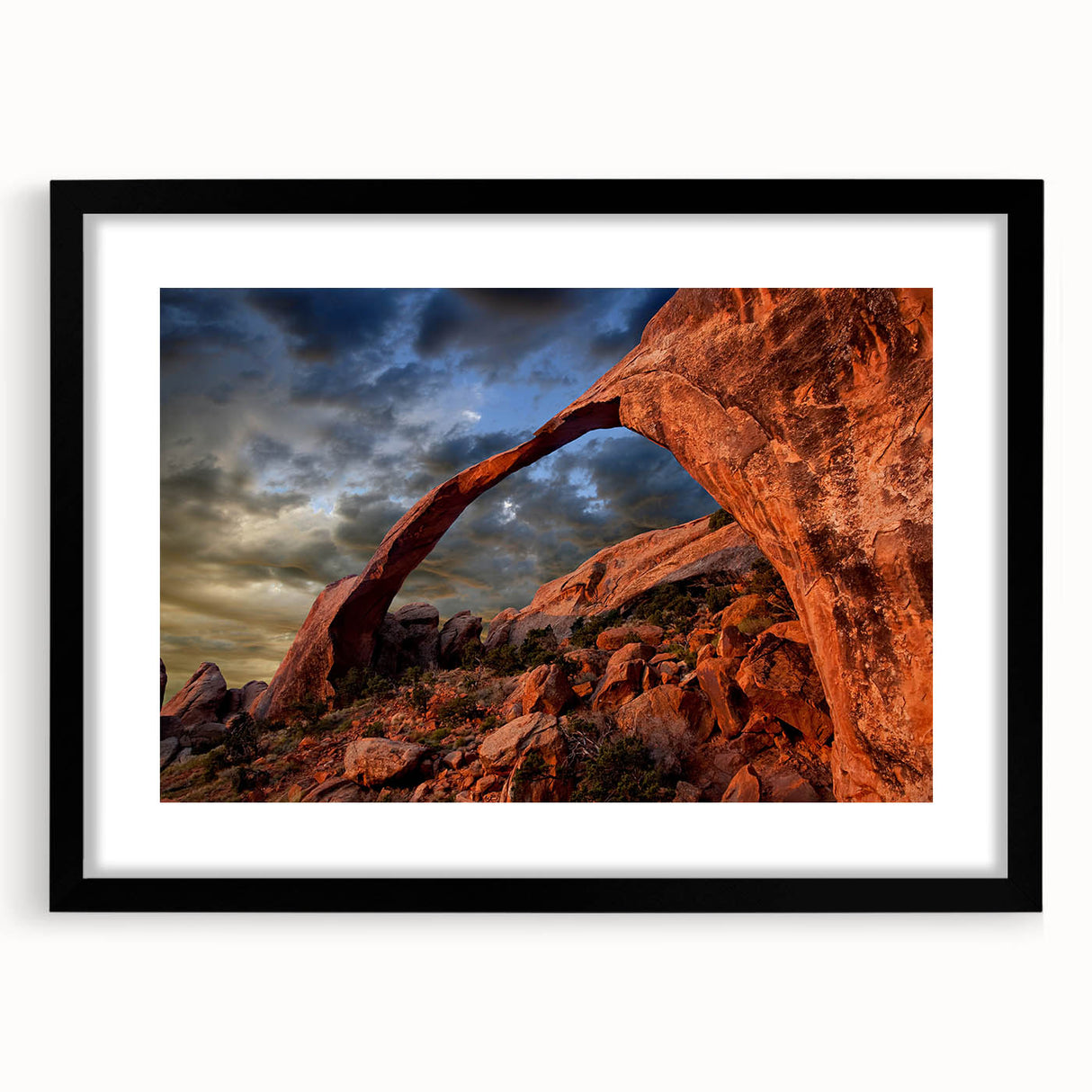 Extra large abstract art print featuring colorful, textured arches on a black framed canvas, ideal for living room decor.