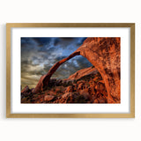 Abstract art print featuring geometric arches in gold and white, framed with a mat, ideal for dining room decor.