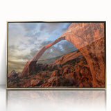 Mid-century modernist art depicting symmetrical arches in gold and black, framed acrylic, suitable for nursery wall art.