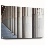 Acrylic print of large abstract wall art featuring architectural columns in muted gray, ideal for dining room decor.
