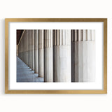 Extra large abstract art print featuring textured columns in muted gold tones on a framed canvas.
