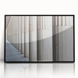 Large abstract wall art featuring black and white architectural columns in a mid-century modernist style.
