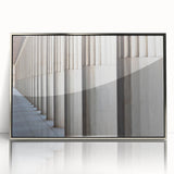 Mid-century modernist art featuring architectural columns in muted gray tones on a framed acrylic.