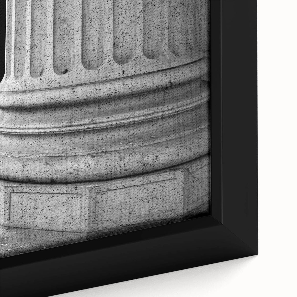 Close-up of black wall art featuring colorful, textured columns design on a framed canvas, ideal for living room decor.