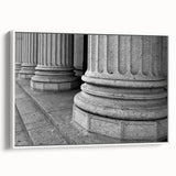 Vintage poster art of classical columns in black and white, framed canvas, suitable for living room decor.