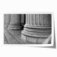 Rolled print featuring a detailed illustration of neoclassical architecture columns in muted gray tones.