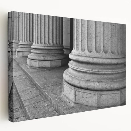 Side view of a large art piece featuring classical architecture columns in black and white on stretched canvas.