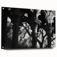 Large abstract wall art on acrylic featuring column designs in soft gray tones.