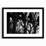 Extra large abstract art print featuring colorful, textured columns, ideal for living room decor, in a black frame with mat.