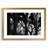 Extra large abstract art print featuring textured columns in muted earth tones, framed in gold, ideal for living room decor.