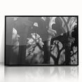 Large abstract wall art featuring black and white architectural columns in a mid-century modernist style.