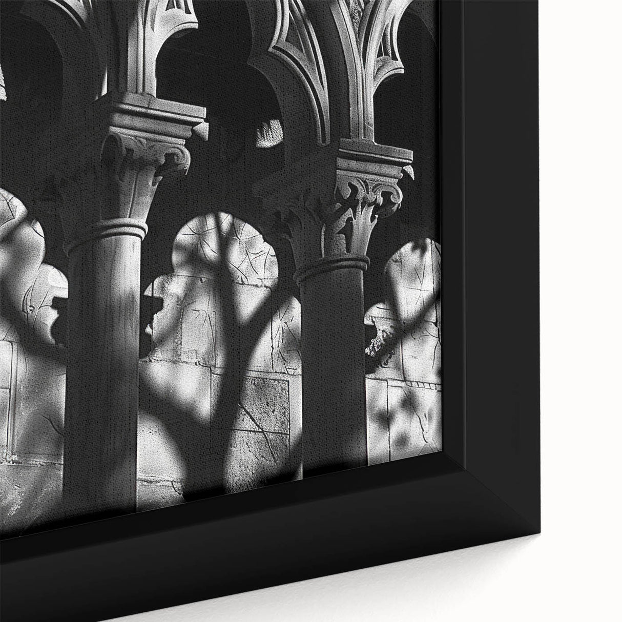 Close-up of black wall art featuring colorful, textured columns design on a large framed canvas, ideal for living room decor.